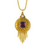 A mid Victorian gold garnet and split pearl locket pendant. Of circular outline, the cushion-shape