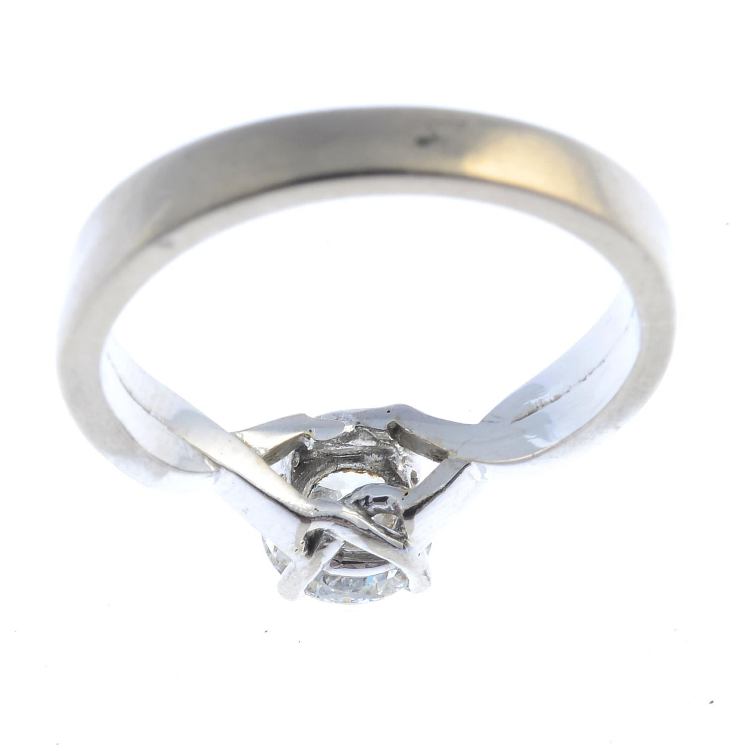 An 18ct gold diamond single-stone ring. The brilliant-cut diamond, weighing 0.85ct, with brilliant- - Image 2 of 3