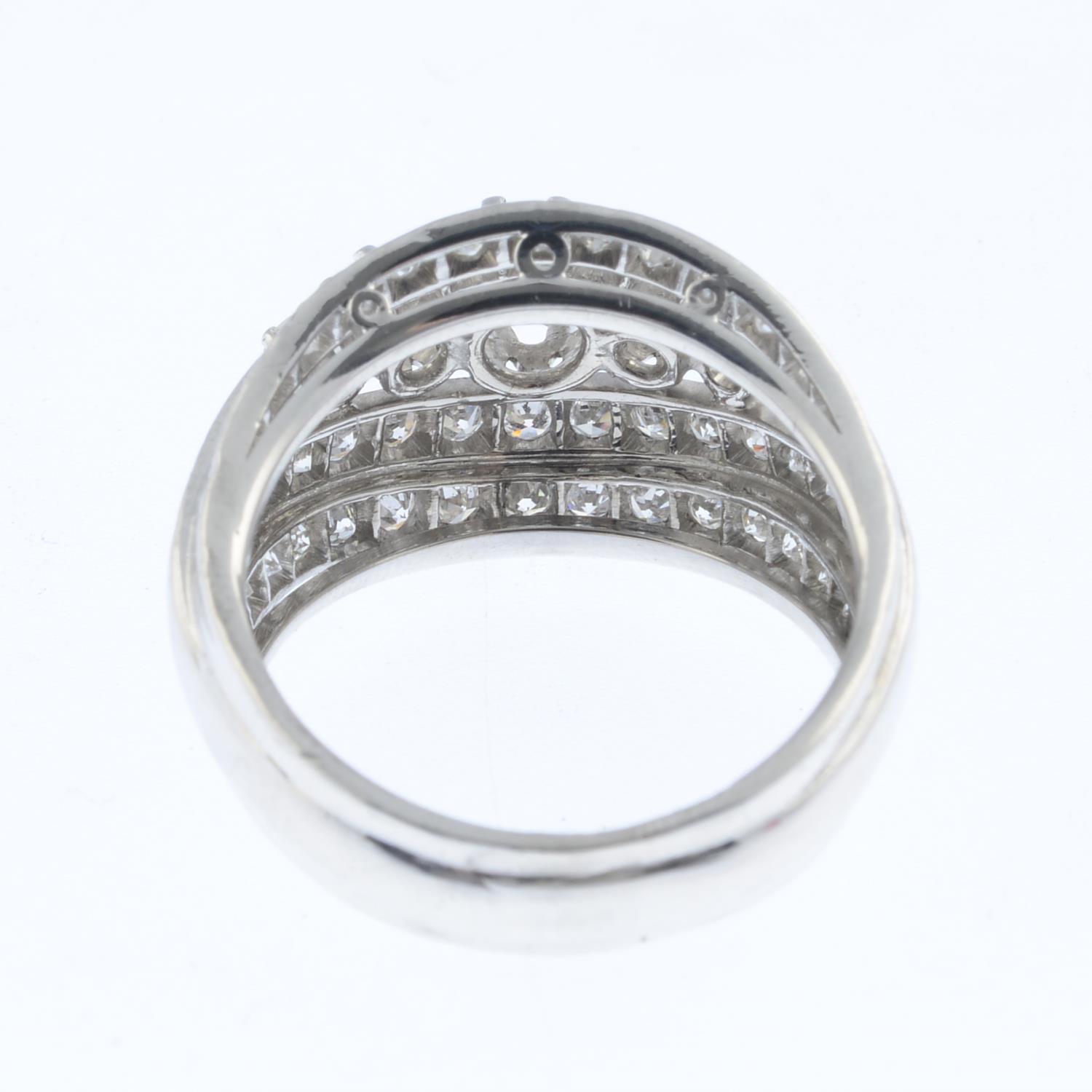 CARL BUCHERER - a diamond dress ring. The graduated brilliant-cut diamond line, with similarly-cut - Image 2 of 3