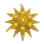 An early Victorian gold tortoiseshell and split pearl brooch. The tortoiseshell star, with split