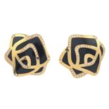 GAVELLO - a pair of diamond and enamel floral earrings. Each designed as a stylised rose, with black