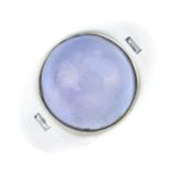 A star sapphire and diamond ring. The circular star sapphire cabochon, with square-shape diamond
