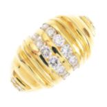 A diamond dress ring. Designed as two brilliant-cut diamond lines, with grooved sides and