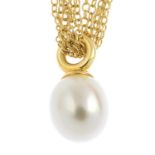 TIFFANY & CO. - a cultured pearl necklace. The cultured pearl, with plain mount, suspended from a