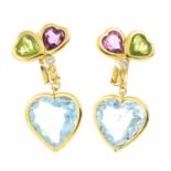 A pair of 18ct gold diamond and gem-set earrings. Each designed as a heart-shape blue topaz