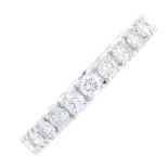 A diamond full eternity ring. Designed as a brilliant-cut diamond line, with grooved sides.