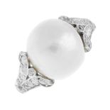 An Edwardian platinum natural pearl and diamond ring. The pearl, measuring approximately 11.8 by