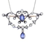 An early 20th century gold sapphire and diamond pendant. Of openwork design, the pear-shape