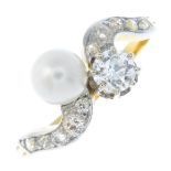 An early 20th century gold, pearl and diamond crossover ring. The circular-cut diamond and pearl