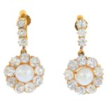 A pair of late Victorian gold natural pearl and diamond earrings. Each designed as a pearl,