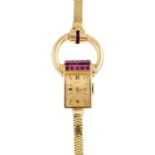 HERMES - a lady's mid 20th century 18ct gold ruby cocktail watch. Of geometric design, the