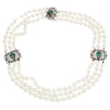 An emerald, diamond and cultured pearl three-row necklace. Designed as three rectangular-shape