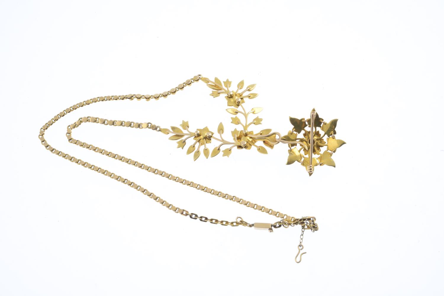 A early 20th century 15ct gold split pearl necklace. The split pearl floral cluster, detachable from - Image 2 of 2