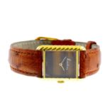 KUTCHINSKY - a lady's 18ct gold tiger's-eye wrist watch. The rectangular tiger's-eye dial, with