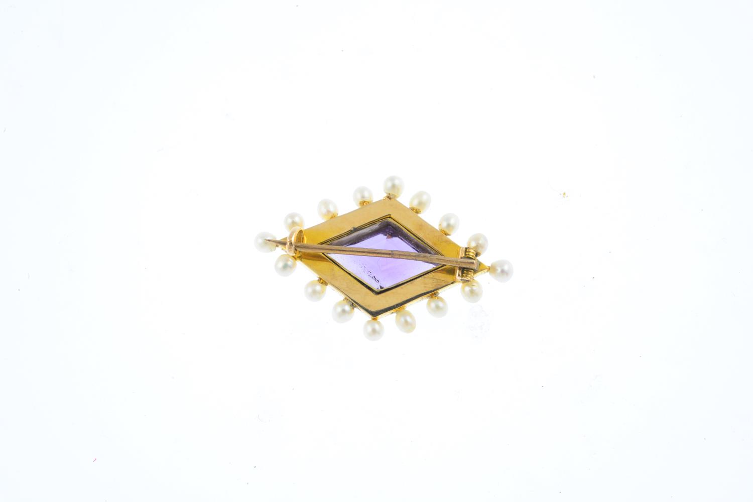 An early 20th century gold, enamel and gem-set brooch. The kite-shape amethyst, with white enamel - Image 2 of 3