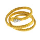 An early 20th century gold diamond snake bangle. Designed as a coiled woven snake, with pave-set