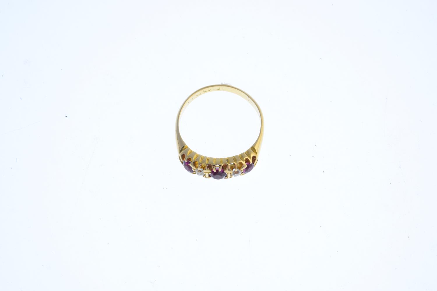 An early 20th century 18ct gold ruby and diamond five-stone ring. The alternate circular-shape - Image 3 of 3
