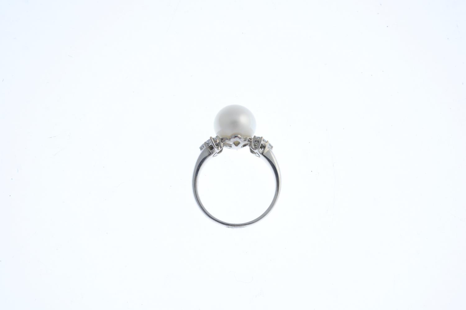 An 18ct gold diamond and cultured pearl dress ring. The cultured pearl, measuring 9.7mms, with - Image 2 of 3