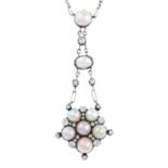 An Edwardian 18ct gold and platinum split pearl and diamond necklace. The split pearl and old-cut