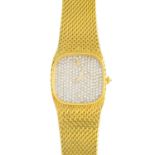 CORUM - a lady's mid 20th century diamond cocktail watch. The pave-set diamond cushion-shape dial,