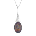 An opal and diamond pendant. The oval black opal cabochon double sided collet, with brilliant and