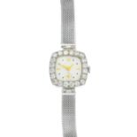 A lady's mid 20th century diamond watch. The cushion-shape dial, with brilliant-cut diamond