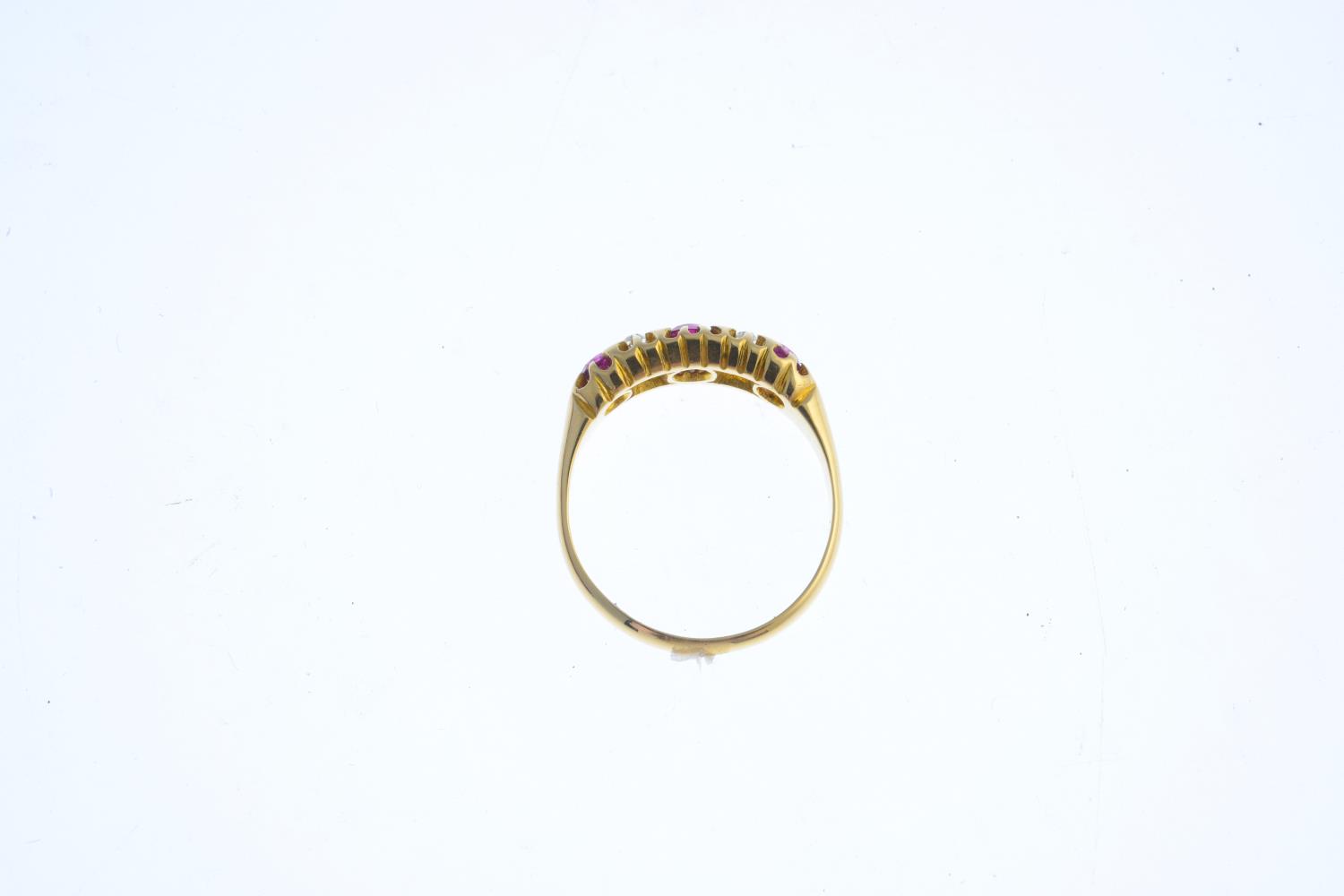 An early 20th century 18ct gold ruby and diamond five-stone ring. The alternate circular-shape - Image 2 of 3