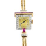 A lady's mid 20th century gold diamond and ruby cocktail watch. The square dial, with Arabic