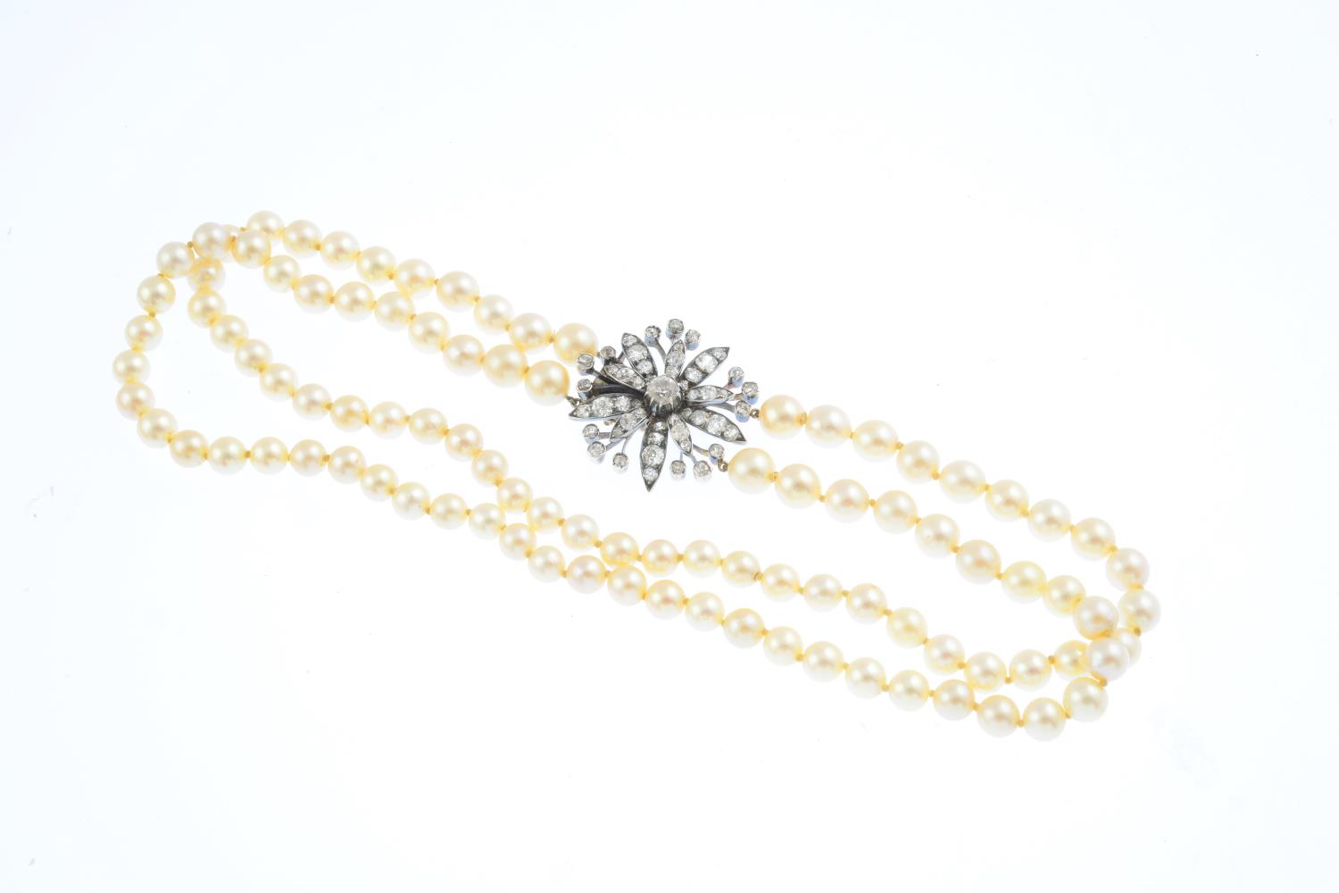 A cultured pearl and diamond necklace. Comprising two graduated cultured pearl strands, to the - Image 2 of 2