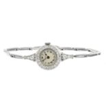 MAPPIN - a lady's mid 20th century platinum diamond cocktail watch. The cream circular dial, with