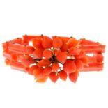 An early Victorian gold coral bracelet. The carved fruit and foliate cluster, to the grooved,