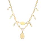 An opal necklace. The pear and heart-shape opal cabochon drop, with oval and marquise-shape opal