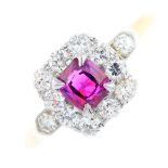 A ruby and diamond cluster ring. The cushion-shape ruby, with brilliant-cut diamond surround and