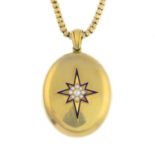 A late Victorian 9ct gold locket, with chain. The oval locket, with split pearl and blue enamel star