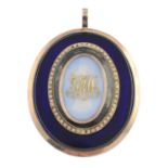 A 19th century gold portrait miniature memorial pendant. Of oval outline, painted to depict a