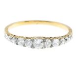 A late Victorian gold diamond hinged bangle. The graduated old-cut diamond line, with rose-cut