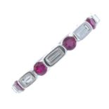 A ruby and diamond full eternity ring.