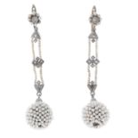 A pair of early 20th century seed pearl and diamond earrings.