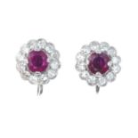 A pair of early 20th century 9ct gold ruby and diamond floral cluster earrings.