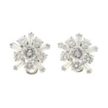KUTCHINSKY - a pair of diamond earrings.