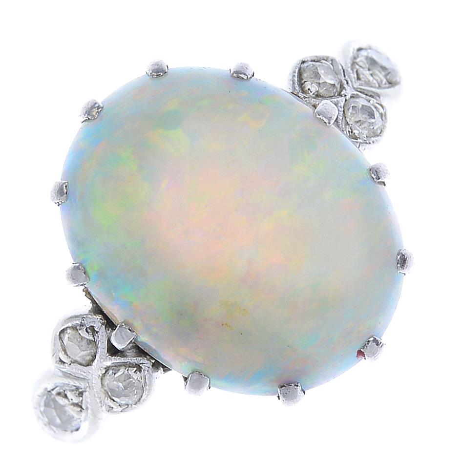 An early 20th century 18ct gold and platinum, opal and diamond ring.