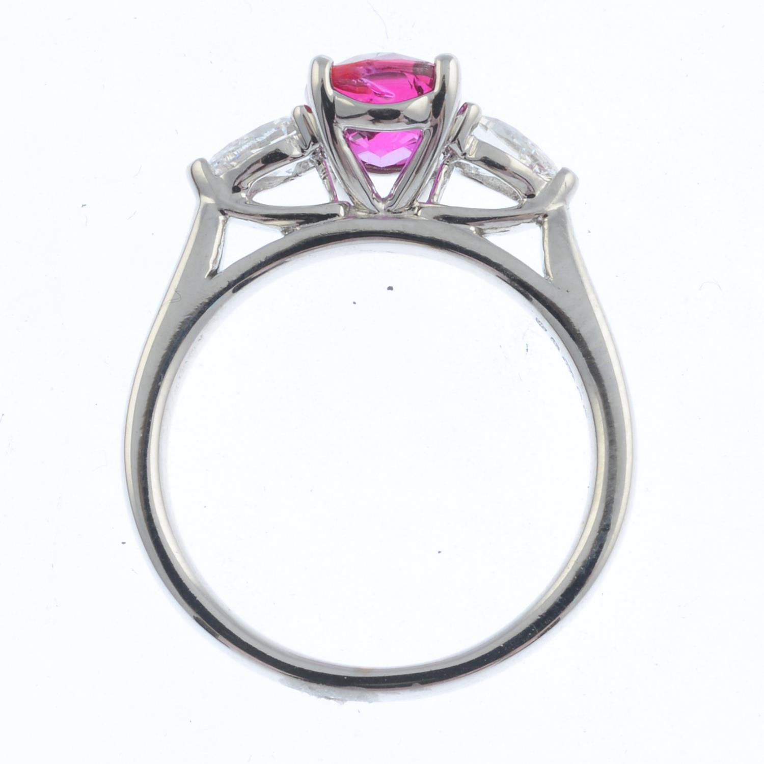 An 18ct gold ruby and diamond three-stone ring. - Image 2 of 3