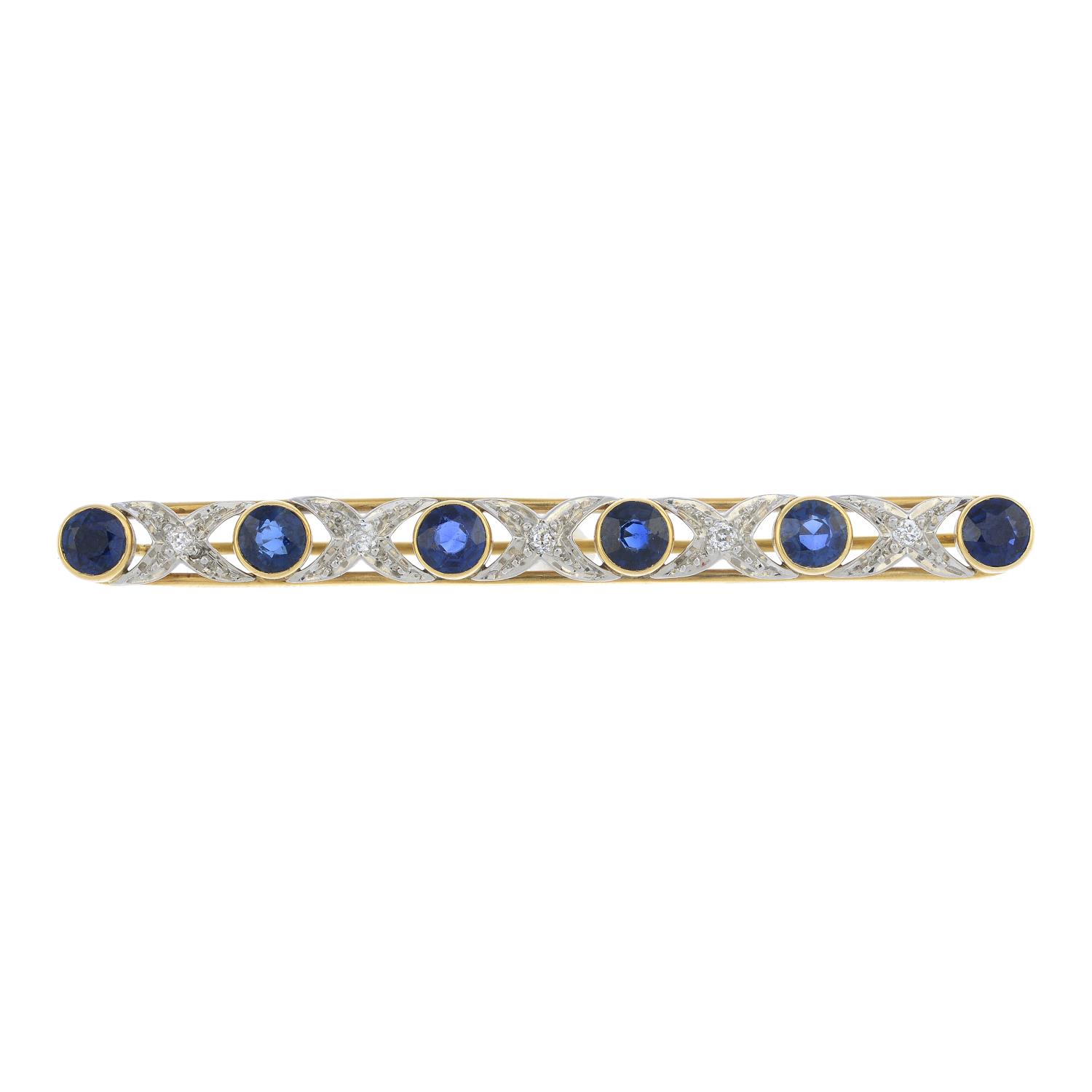 A sapphire and diamond bar brooch.