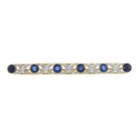 A sapphire and diamond bar brooch.