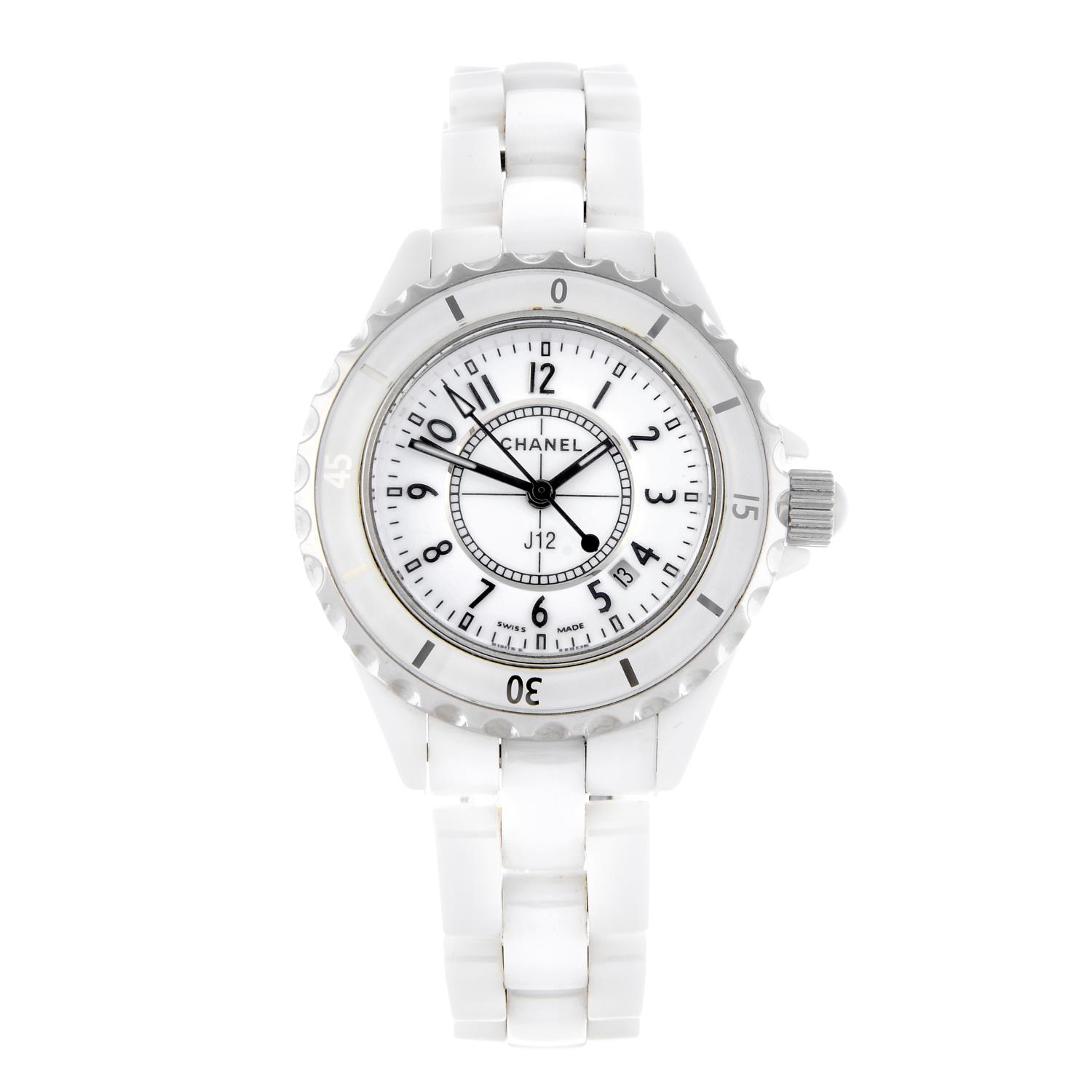 CHANEL - a lady's J12 bracelet watch. Ceramic case with calibrated bezel and stainless steel case