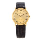 UNIVERSAL GENEVE - a gentleman's Golden Shadow wrist watch. Yellow metal case, stamped 18K 0,750