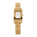 CORUM - a lady's Tabogan bracelet watch. 18ct yellow gold factory diamond set case. Reference 165