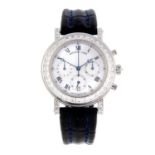 BREGUET - a Marine chronograph wrist watch. Platinum factory diamond set case and lugs, bezel set