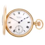 A half hunter pocket watch by Waltham. 9ct yellow gold engraved case, hallmarked Birmingham 1939.