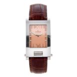 CORUM - a gentleman's Tabogan wrist watch. Stainless steel case. Reference 56.151.20, serial 593810.
